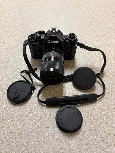 Canon A-1 35mm SLR Film tested working w/ CANON FD 35-70mm 1:4 lens Canon A1.