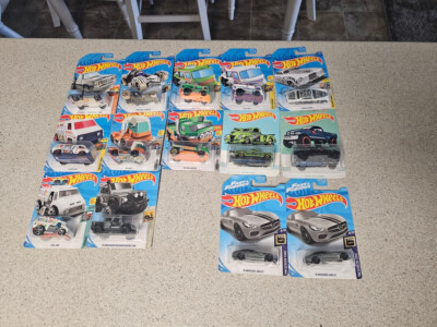 Lot OF 14 HOT WHEELS ALL NEW. VARIETY AND DIFFERENT YEARS. SEE PICS