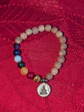 Sandalwood And Chackra Bead Bracelet With A Buddha Charm