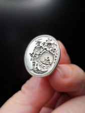 Antique silver wax seal fob with Renaissance Musketeers and nautical coat of arm