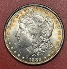 1885 P Morgan Silver Dollar, Choice Uncirculated. Old Golden Toning.