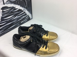 aldo black and gold sneakers