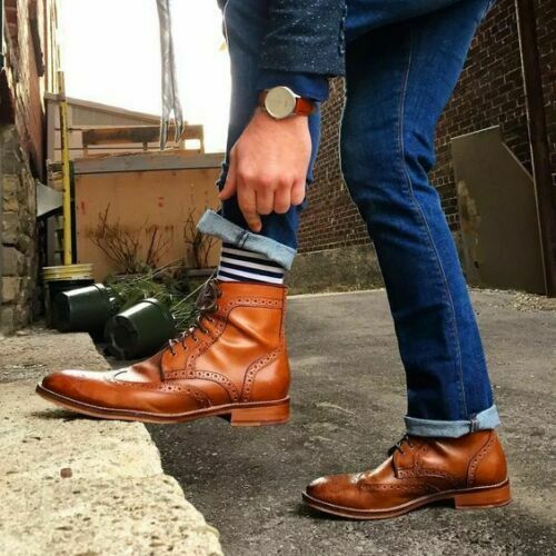 brown dress shoes and jeans