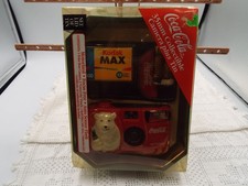 Coca Cola 35mm Collectible Camera w Preloaded Film  Christmas Tin Box Year 2000