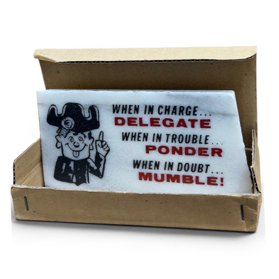 NOS (New Old Stock) pirate-themed desk sign with original box — 'When In Charge, Delegate' is the motto we all secretly live by.