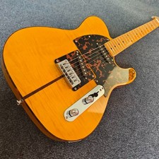 Electric guitar, peach blossom core xylophone body, bark veneer