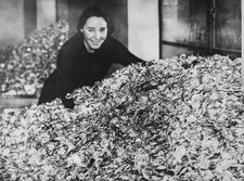 Recovery of metal caps from milk bottles for manufacture of milita- Old Photo