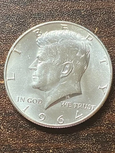 1964 p Kenedy silver half dolla a very fine coin . plus a surprise