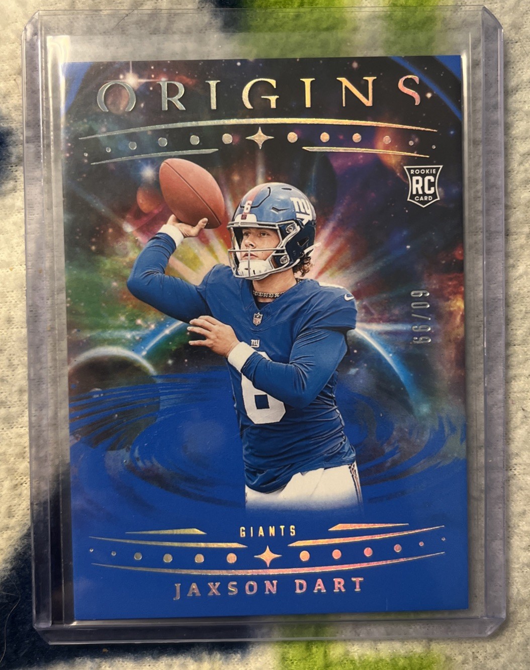 2025 Panini Origins - Rookies Jaxson Dart, Jaxson Dart #145 Blue /99 (RC)