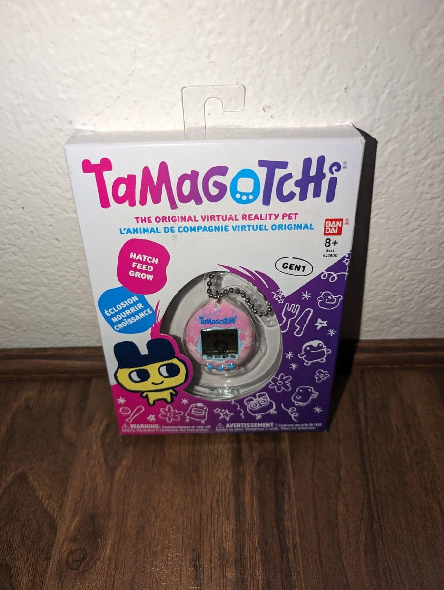 Tamagotchi Gen 1 Virtual Pet – Purple Shell – Bandai Tamagotchi Gen 1 Virtual Pet – Purple Shell – Bandai