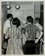 1966 Press Photo People looking at an exhibit during a Science Fair - lra10177