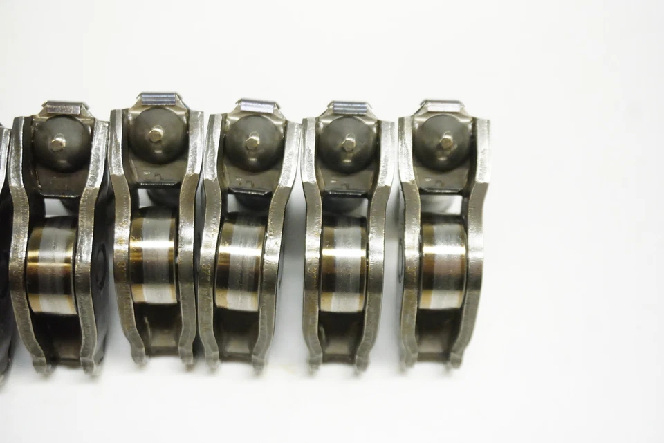 Juego de brazo basculante del árbol de levas de escape Volkswagen Passat 2.0T 2020-2022 06E109409J OEM Foto 3 de 3