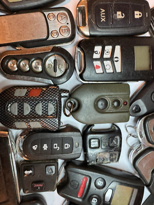 Lot of 28 Aftermarket Keyless Entry Remote Fob MIXED FCC IDS MIXED PART
