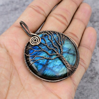 Ciondolo gioiello in rame con pietra preziosa in labradorite fatto a