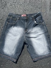 Baggy denim shorts faded wash Size 34 waist.