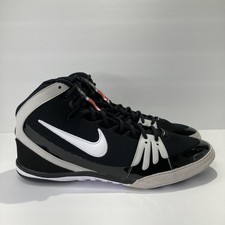 white and black nike freeks