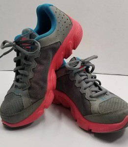 gray and pink under armour shoes