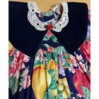 Navy velvet dress with white lace collar, red and yellow fruit print, and “D&G” label on inner neckline.