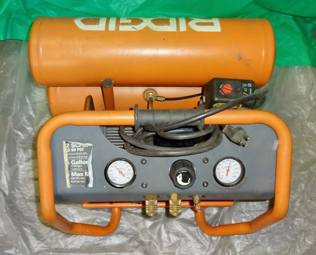 RIDGID Twin Stack Oil Free 4.5 Gal Portable Air Compressor. Model OF45150