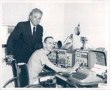 1961 People Business Equipment Typewriter Wheel Chair Vintage Image Press Photo