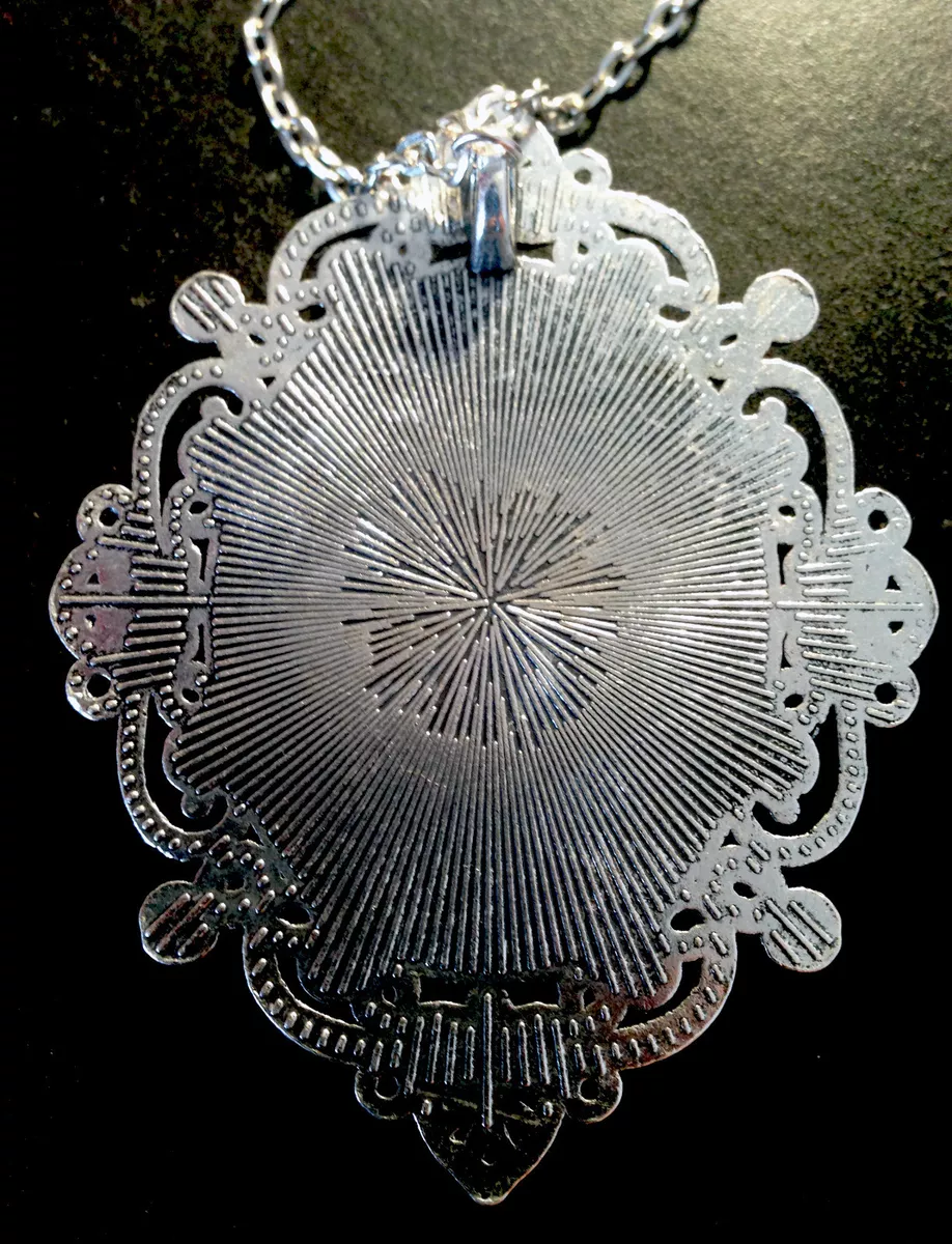 Poe silver brooch online