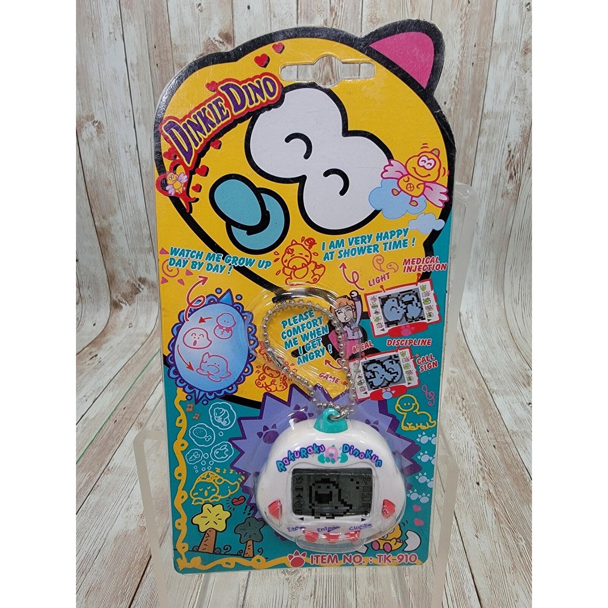 Dinkie Dino Raku Raku DinoKun Japanese Virtual Pet TK-910