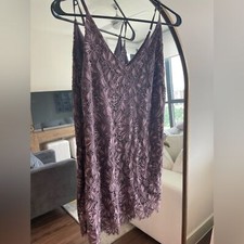 Xtraordinary floral lace mini dress. Mauvey-purple. Cut out hem. Size XS.