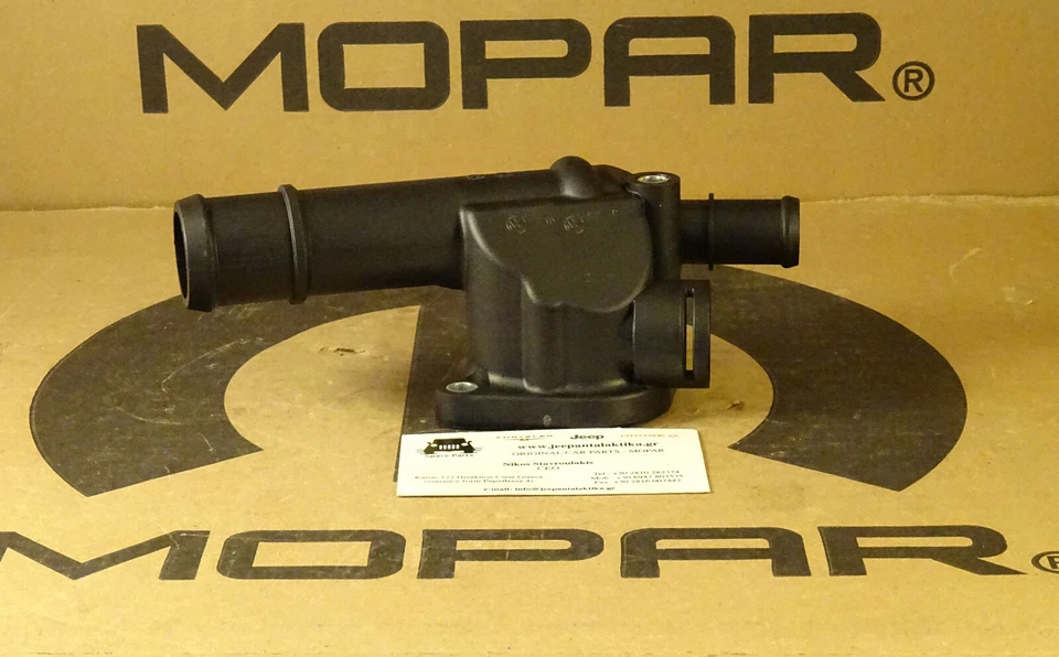 Carcasa de salida de agua Jeep Compass / Patriot MK 07-09 68001300AA nueva generación Mopar Foto 3 de 4