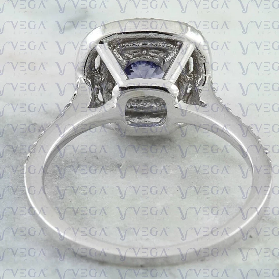 Anillo redondo de 4,50 quilates con doble halo de diamantes de tanzanita natural enchapado en platino 950PT Foto 4 de 4