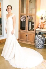 Wedding dress worn once, in great condition! Has sequence giving glittery look.