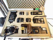 olympus OM1 camera plus 4 lenses, flash, tripod, Olympus AX and AF-10