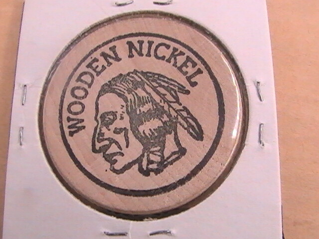 WOODEN NICKEL AKERS BARBER SHOP DELTA MART JACKSON MISS YOUR HEAD IN OUR BUSINES