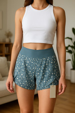 Halara Size Medium Reflective Curved Hem 2 in 1 Lepard Teal Print Yoga Shorts