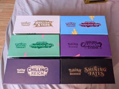 Bulk Pokémon Karten und 7 leere Elite Trainer Boxen