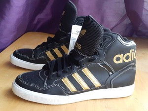 adidas black and gold high tops