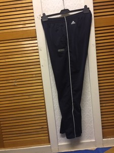 the brand with the three stripes tracksuit