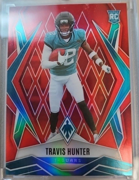 Travis Hunter 2025  Panini Red Phoenix   # 157 Jaguars 79/99