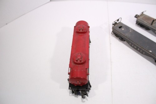 2 vagones planos de troncos vintage Lionel calibre O gris posguerra años 50 y 1 coche cisterna rojo - Imagen 8 de 19