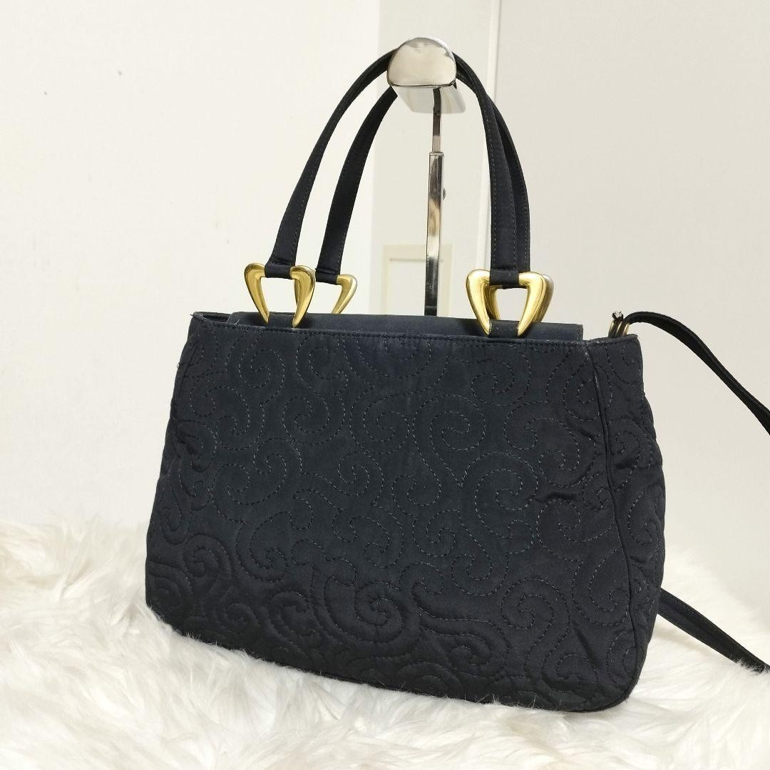 Borsa a mano Yves Saint Laurent punto arabesco nylon pelle borsa a tracolla vintage