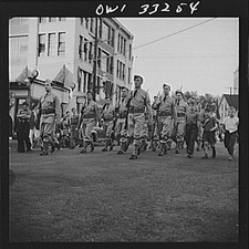 Photo:WWII Soldiers Parade Main Street Small Town 1940s Military Marching