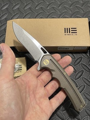 WE Knife Co. - 611J - Stonewashed Brown Titanium Scales w/ a S35VN Blade.