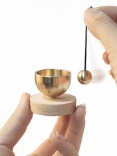 This modern Buddhist altar bell set features beautifully tuned sounds and is