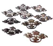Vintage Batwing Chippendale Metal Drop Bail Drawer pulls with a center cutout.