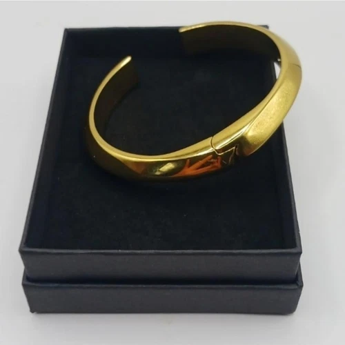 Bracciale con cerniera Kate Spade tono oro 