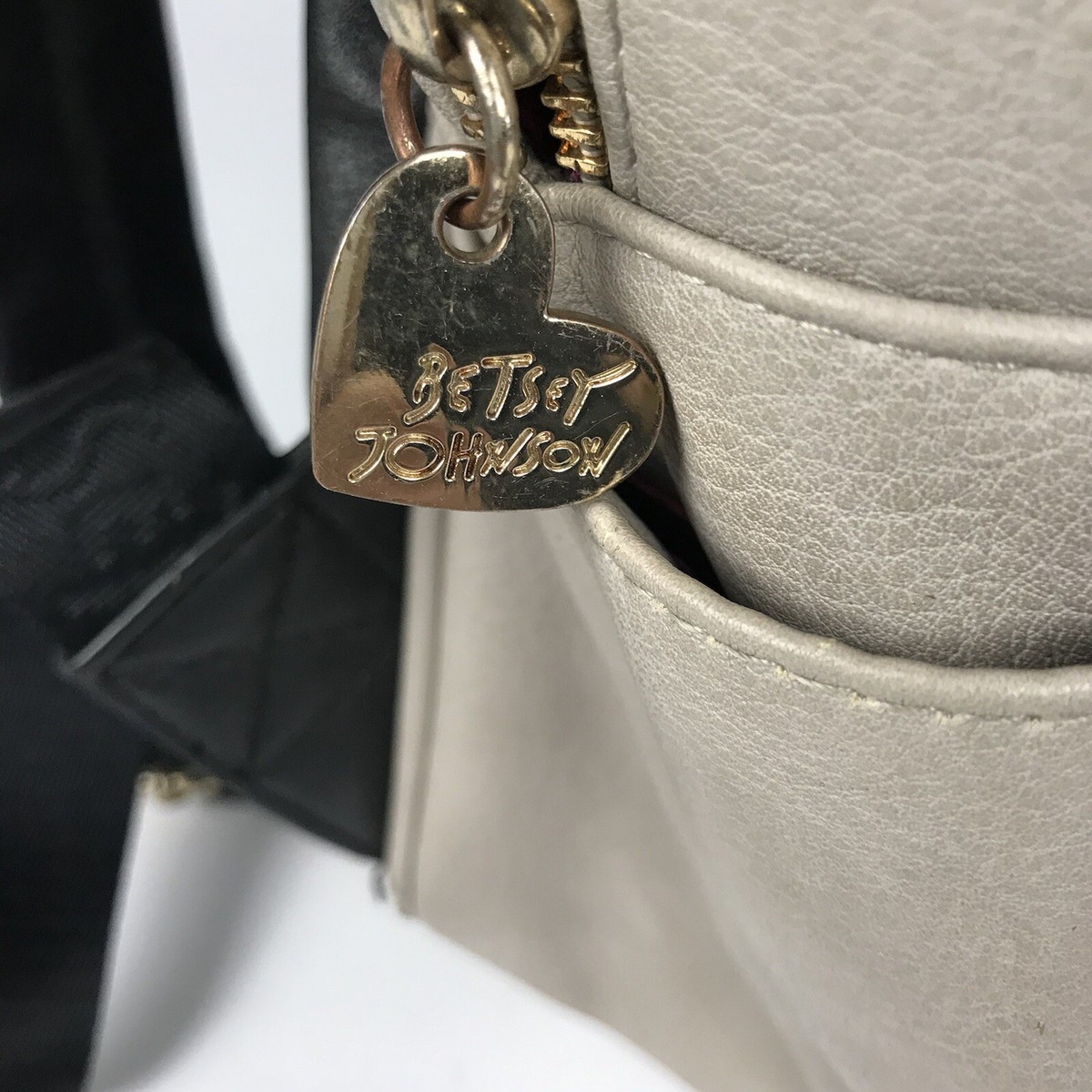Betsey Johnson Zip Backpack
Beige Leather Black Bow Book
Bag Explore Betsey Johnson main image 4
