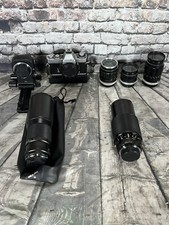 Minolta XD-5 35mm Film Camera W 5 Lenses, filters and auto bellows read descript