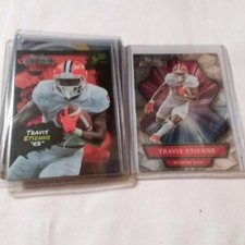 2021 WILD CARD ALUMINATION TRAVIS ETIENNE ROOKIE CARD + Light Show insert