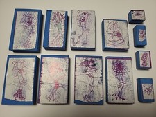 Lot de 12  tampes vintage de tenues de barbie 1992