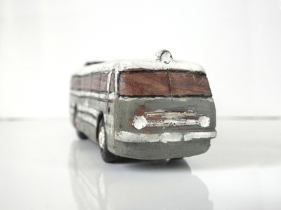 Ikarus 55 signed wood carving made of black walnut wood
