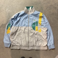 80s Adidas windbreaker jacket with blue,beige, an yellow green circular graphic